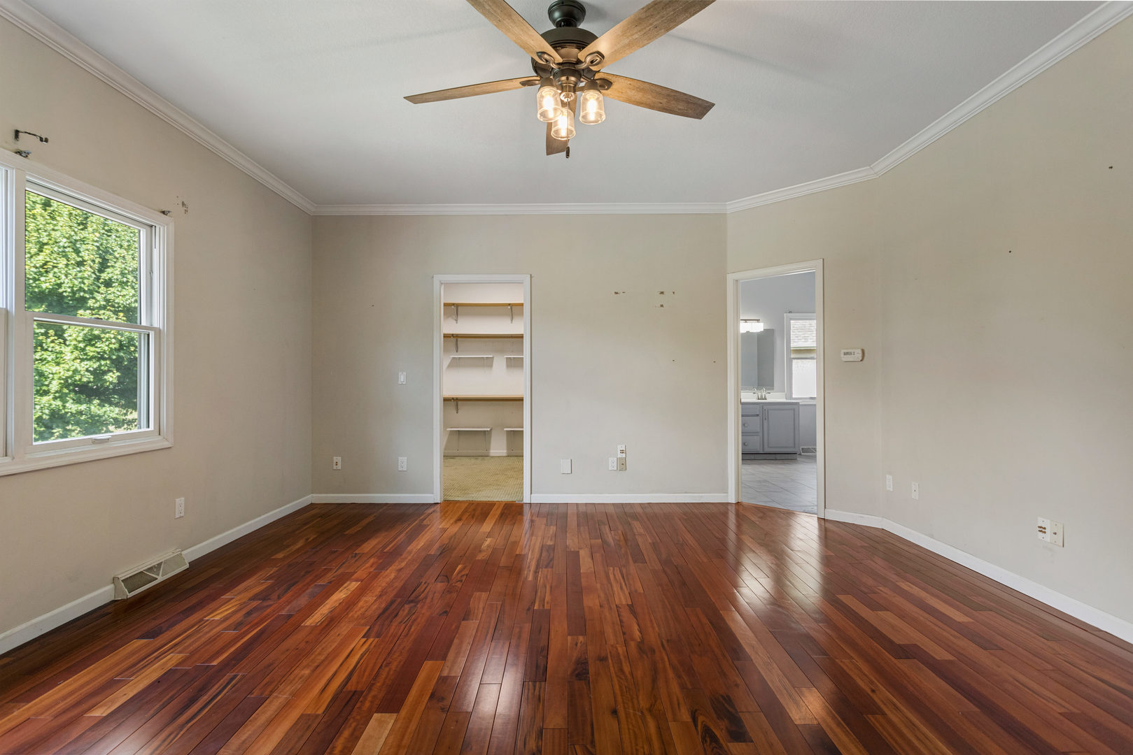 1511 River Bluff Court Mahomet, IL 61853 - Photo 17 of 50 wooden floor in an empty room with a window