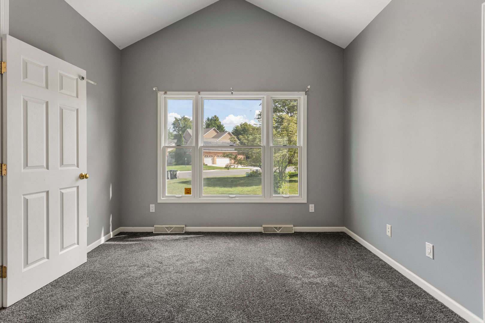 1511 River Bluff Court Mahomet, IL 61853 - Photo 22 of 50 an empty room with a window