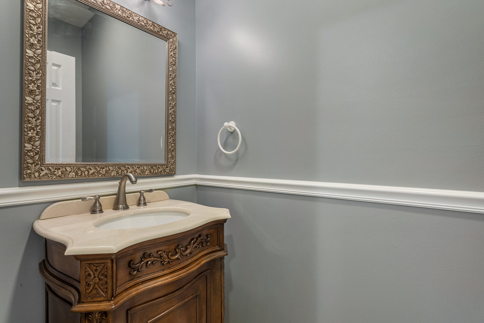 1511 River Bluff Court Mahomet, IL 61853 - Photo 29 of 50 a sink with a mirror