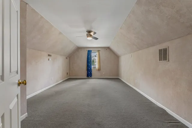 a view of a room with an empty space