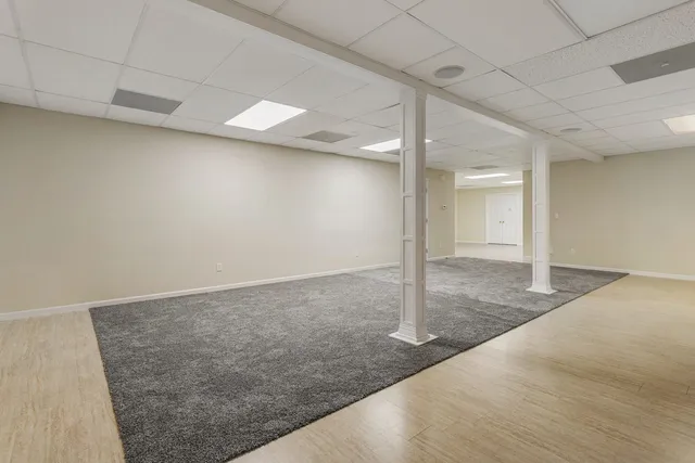 a view of a livingroom with a staircase