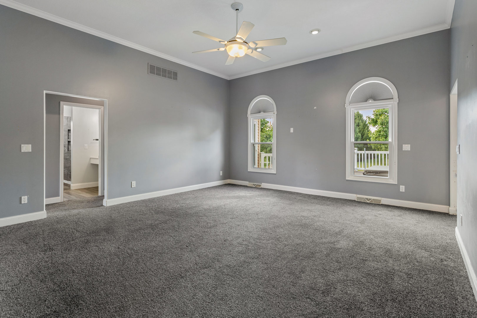 1511 River Bluff Court Mahomet, IL 61853 - Photo 5 of 50 a view of an empty room with a window