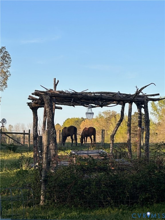 17088 Old Ridge Road Montpelier, VA 23192 - Photo 18 of 18 Rustic wooden arbor with a decorative chandelier f