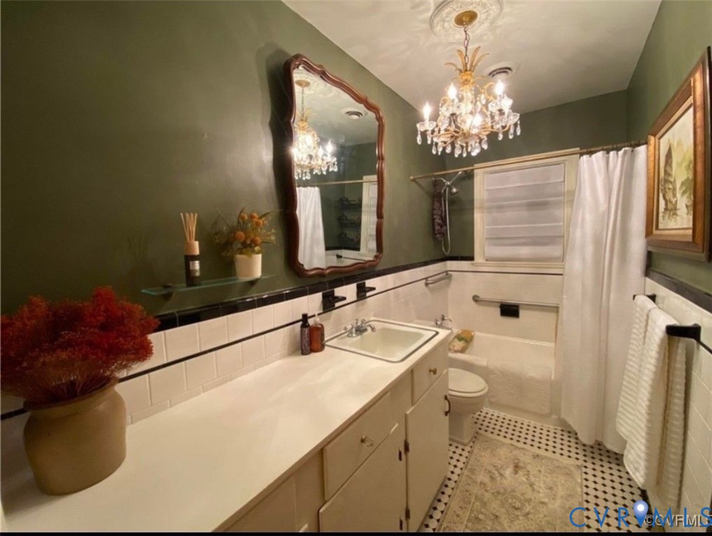17088 Old Ridge Road Montpelier, VA 23192 - Photo 6 of 18 Bathroom featuring a classic white and black tiled