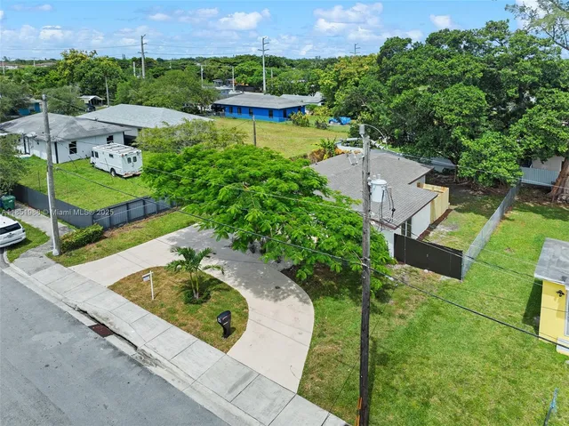 a view of a garden with a lake view