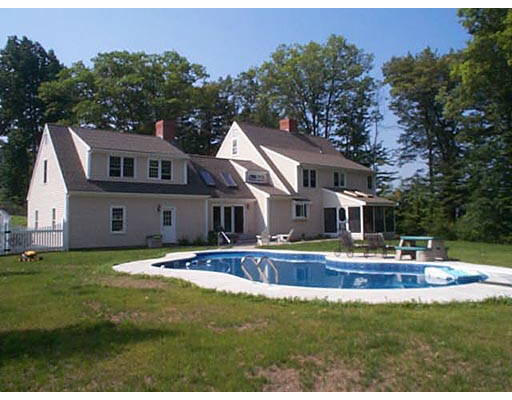 30 Kettle Hole Road Bolton, MA 01740 - Photo 2 of 6 a front view of a house with a yard