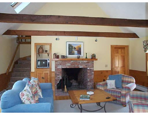 30 Kettle Hole Road Bolton, MA 01740 - Photo 4 of 6 a living room with furniture and a fireplace