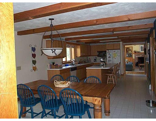 30 Kettle Hole Road Bolton, MA 01740 - Photo 5 of 6 a dinning table and chairs in a room