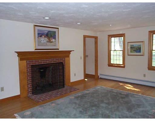 30 Kettle Hole Road Bolton, MA 01740 - Photo 6 of 6 a view of an empty room with window and fireplace