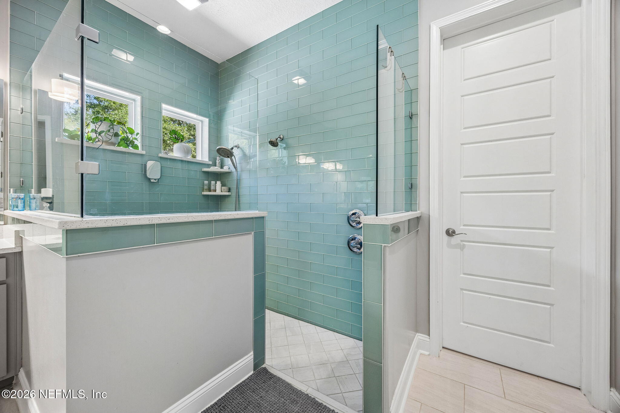 85949 Miner Pines Yulee, FL 32097 - Photo 22 of 55 a bathroom with a shower and a sink