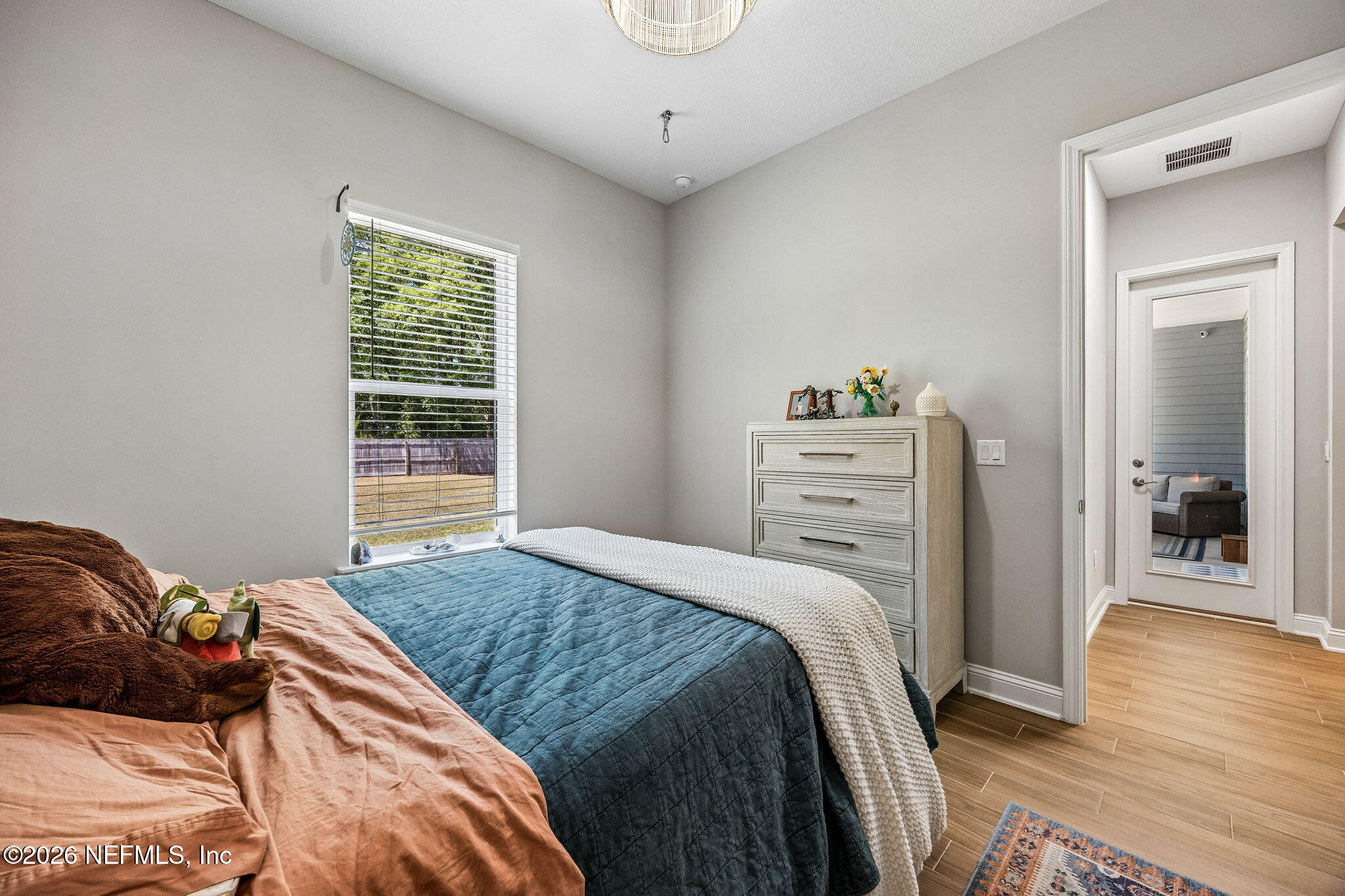 85949 Miner Pines Yulee, FL 32097 - Photo 25 of 55 a bedroom with a bed and a window