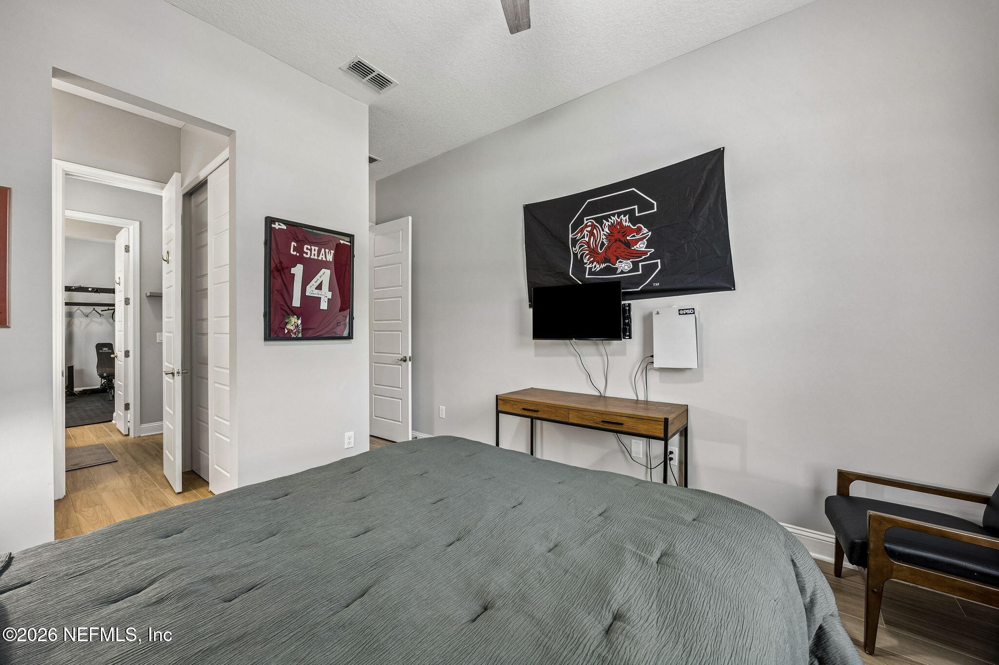 85949 Miner Pines Yulee, FL 32097 - Photo 28 of 55 a bedroom with furniture and a wall paintings