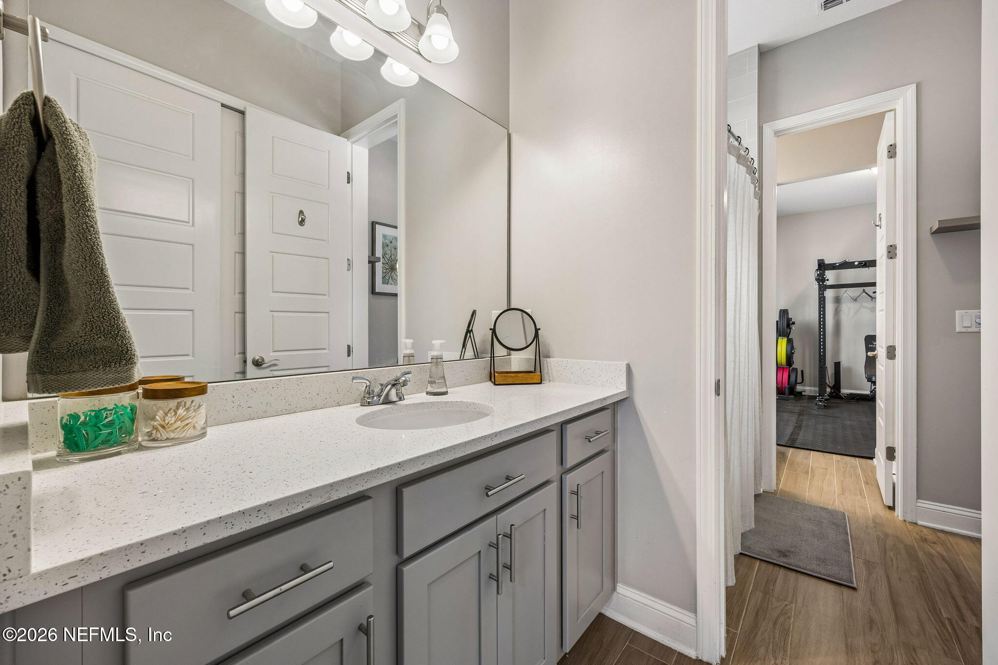 85949 Miner Pines Yulee, FL 32097 - Photo 29 of 55 a bathroom with a sink and a mirror