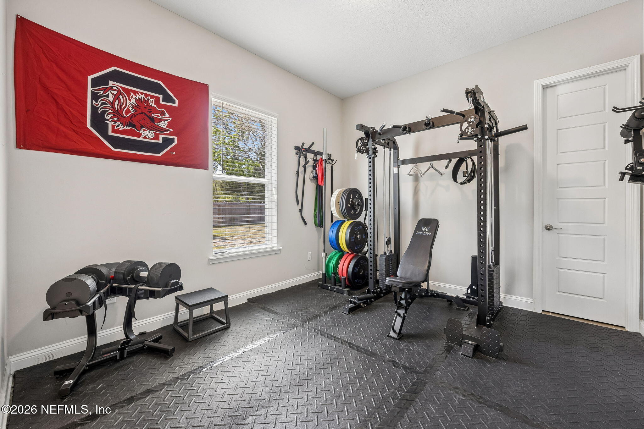 85949 Miner Pines Yulee, FL 32097 - Photo 34 of 55 a view of a room with gym equipment