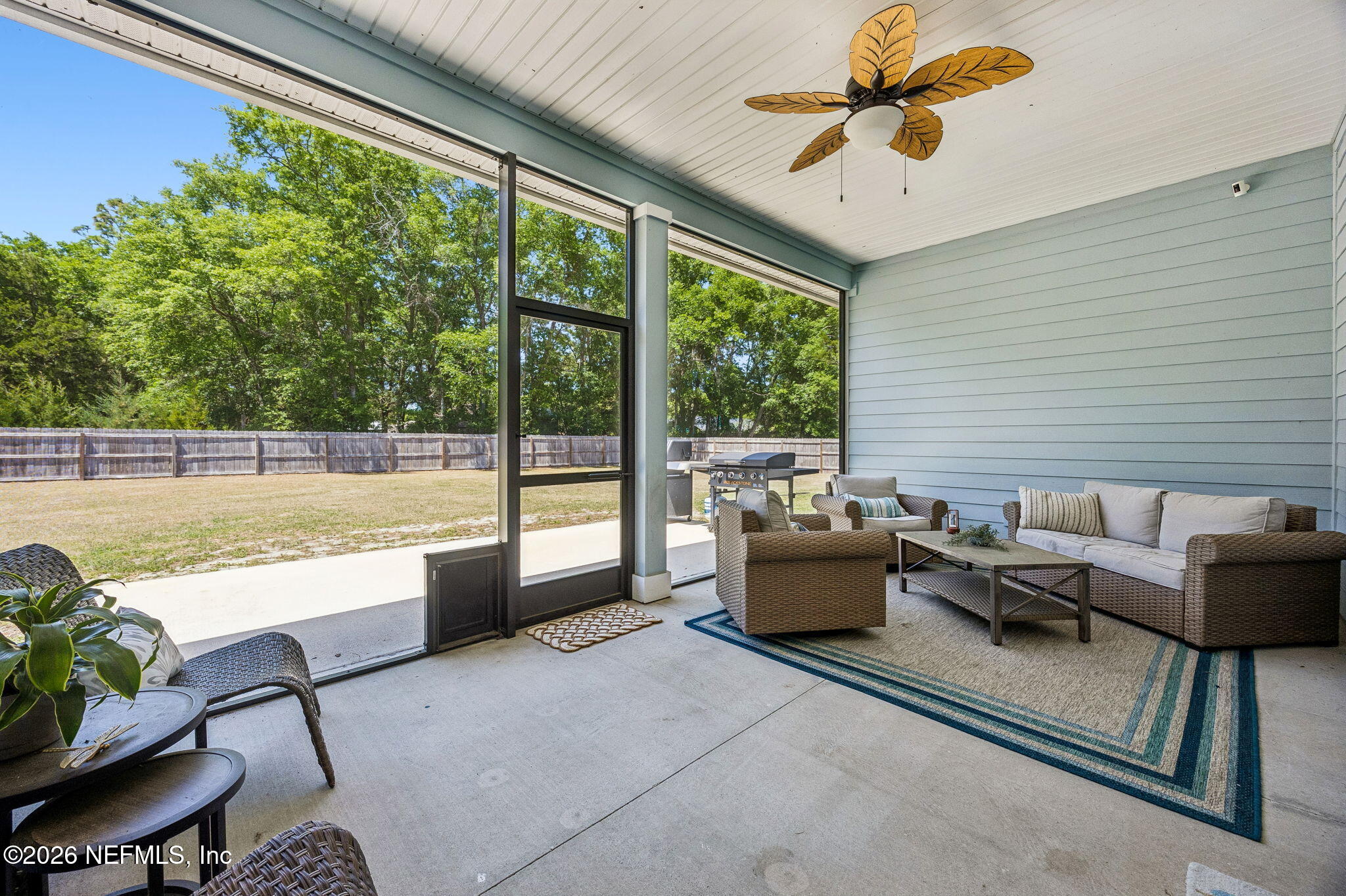 85949 Miner Pines Yulee, FL 32097 - Photo 38 of 55 a living room with furniture and a large window
