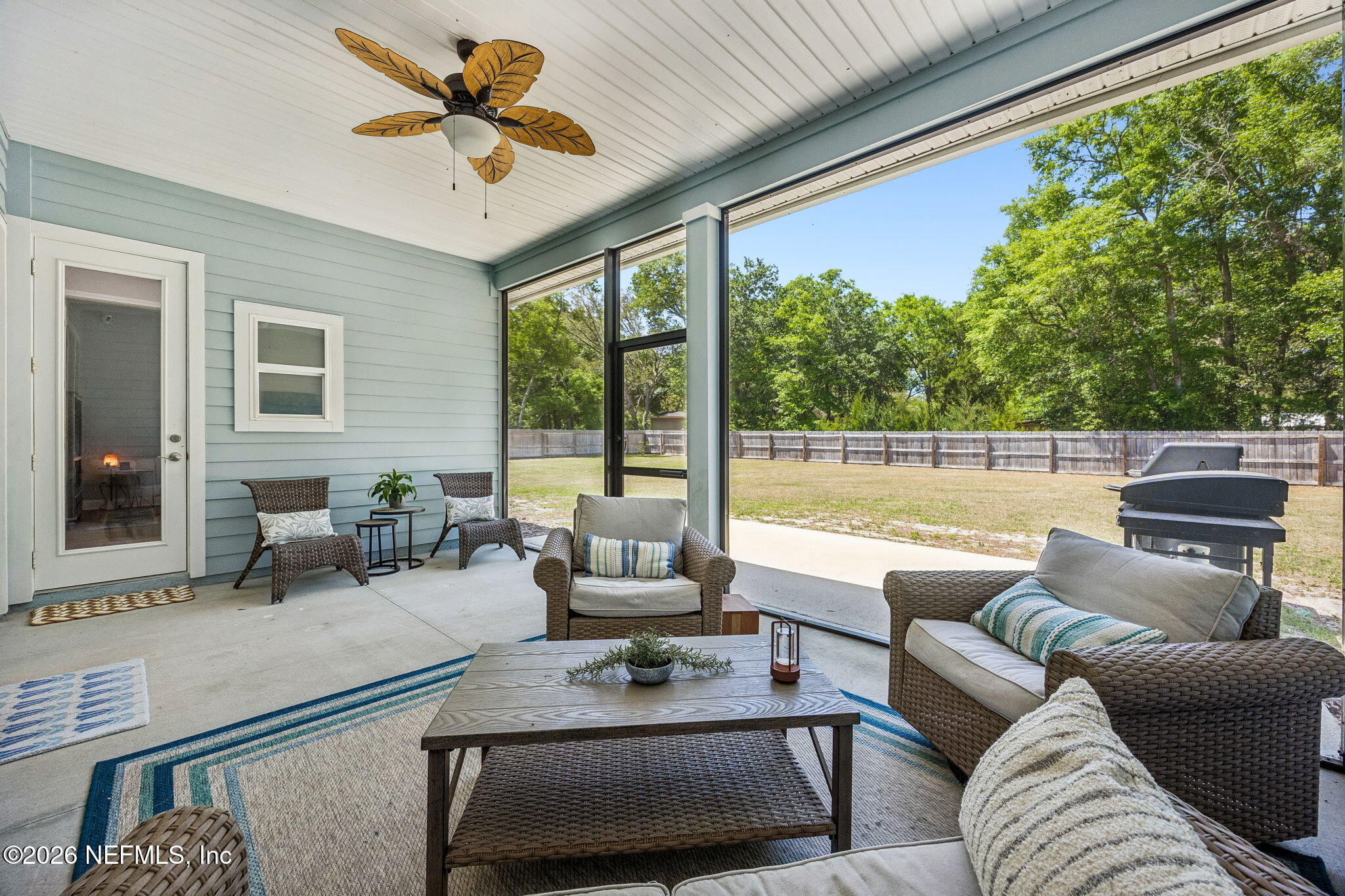 85949 Miner Pines Yulee, FL 32097 - Photo 39 of 55 a living room with furniture and a large window