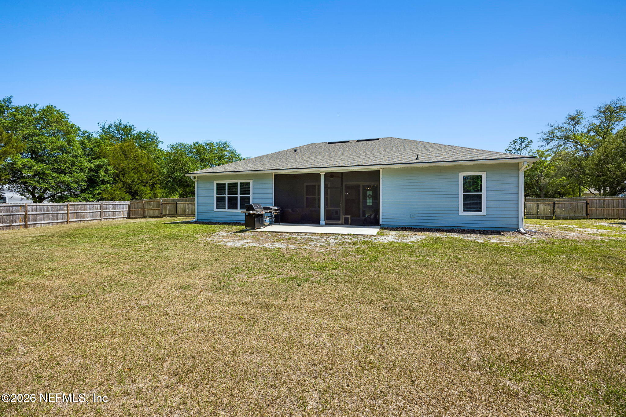 85949 Miner Pines Yulee, FL 32097 - Photo 45 of 55 a front view of house with yard