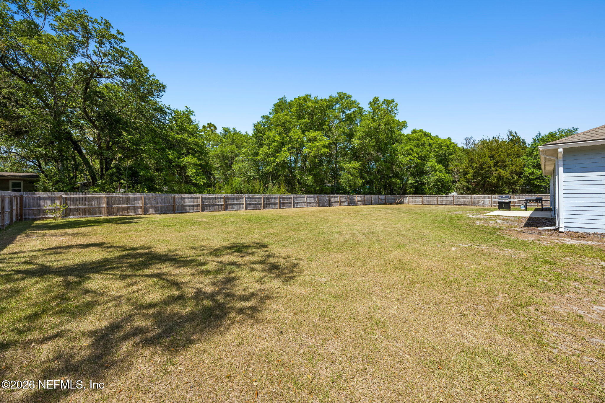 85949 Miner Pines Yulee, FL 32097 - Photo 47 of 55 a view of a swimming pool and a yard