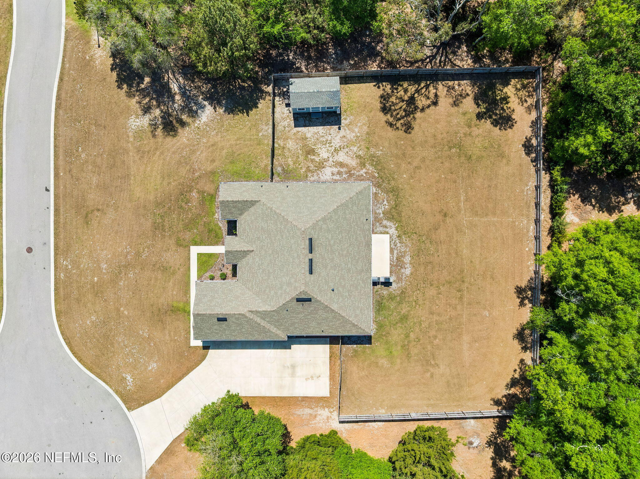 85949 Miner Pines Yulee, FL 32097 - Photo 49 of 55 an aerial view of a house with a swimming pool
