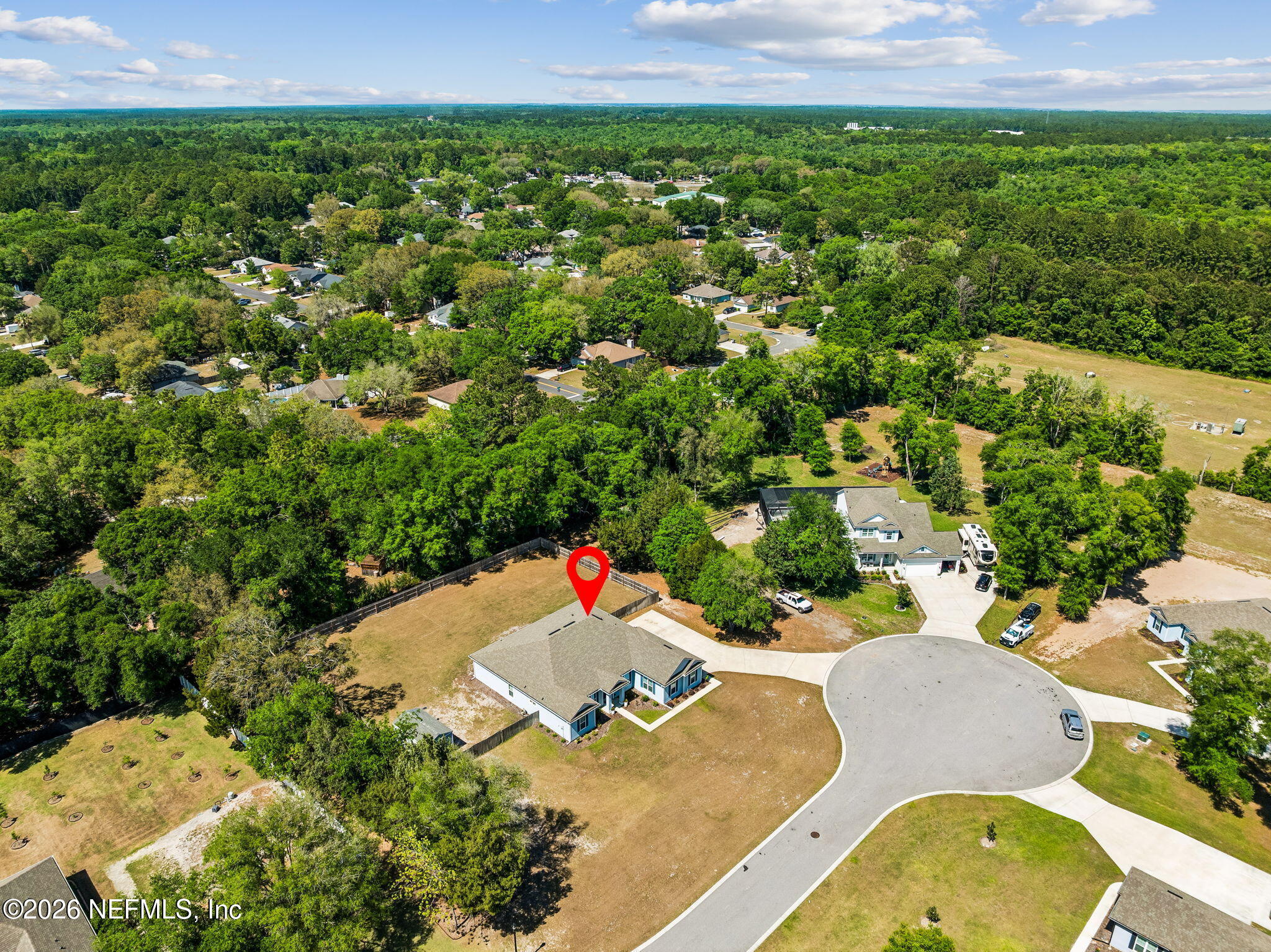 85949 Miner Pines Yulee, FL 32097 - Photo 50 of 55 an aerial view of a house with a yard
