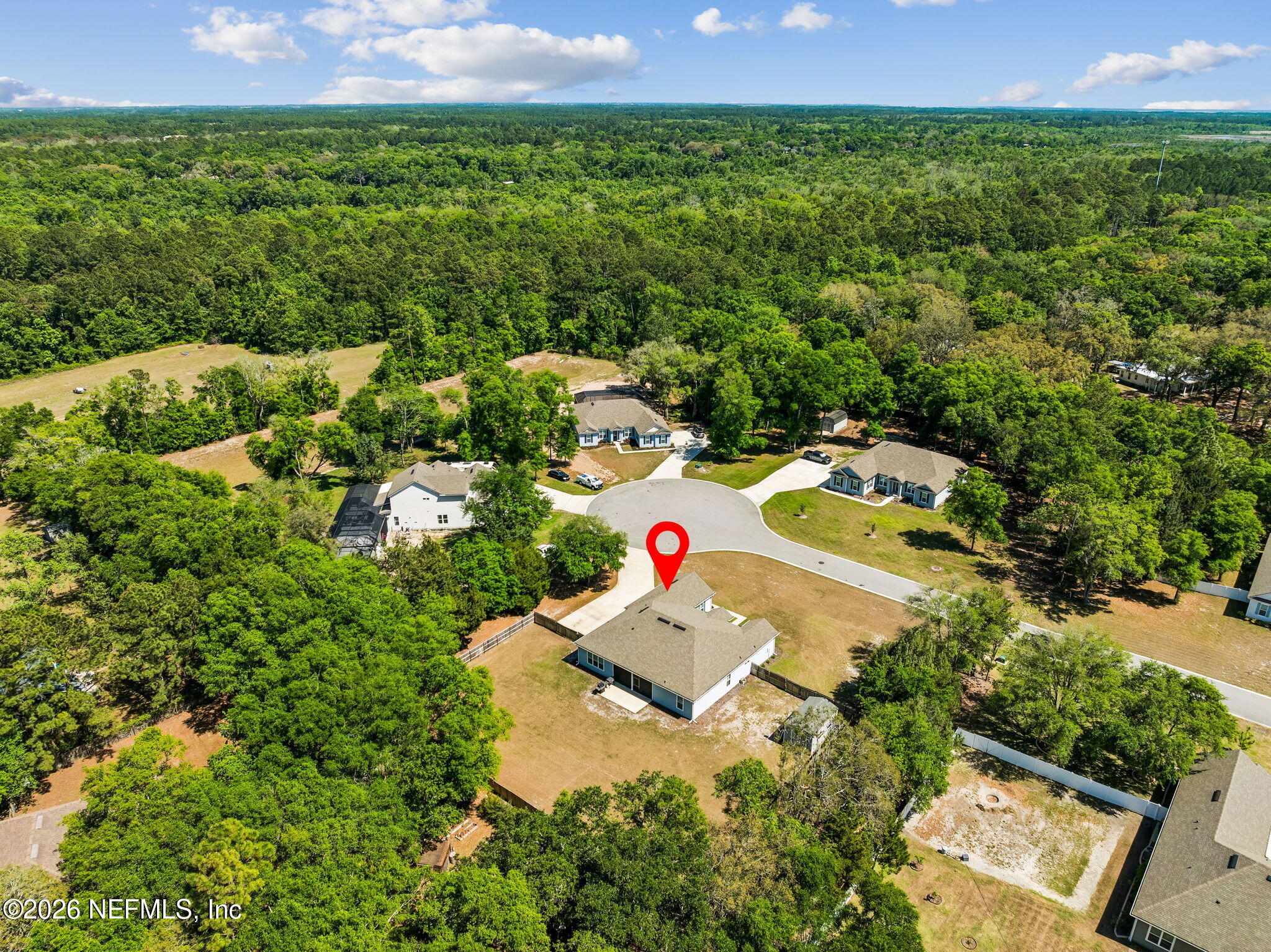 85949 Miner Pines Yulee, FL 32097 - Photo 51 of 55 an aerial view of a house with a yard