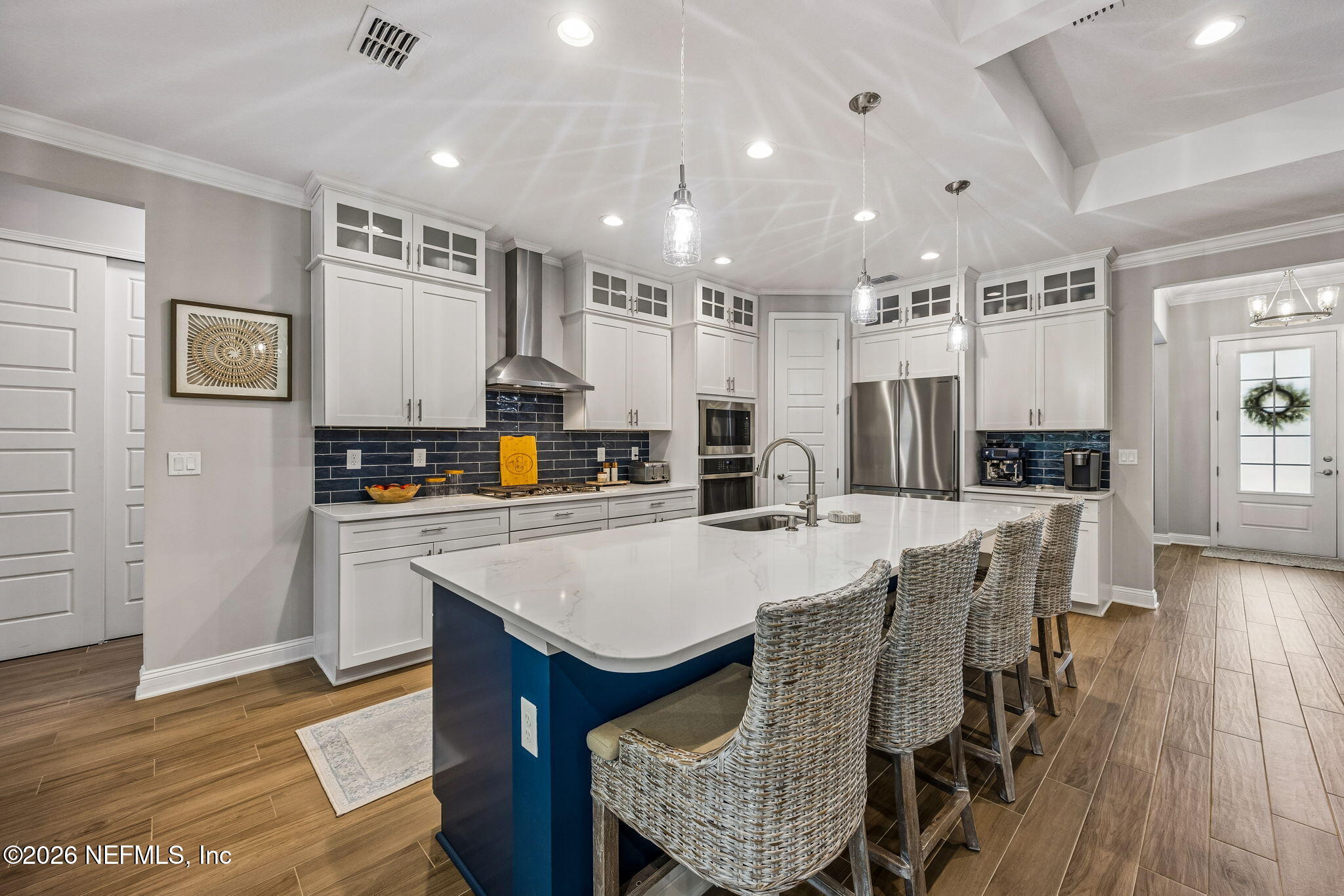 85949 Miner Pines Yulee, FL 32097 - Photo 5 of 55 a large kitchen with a table and chairs