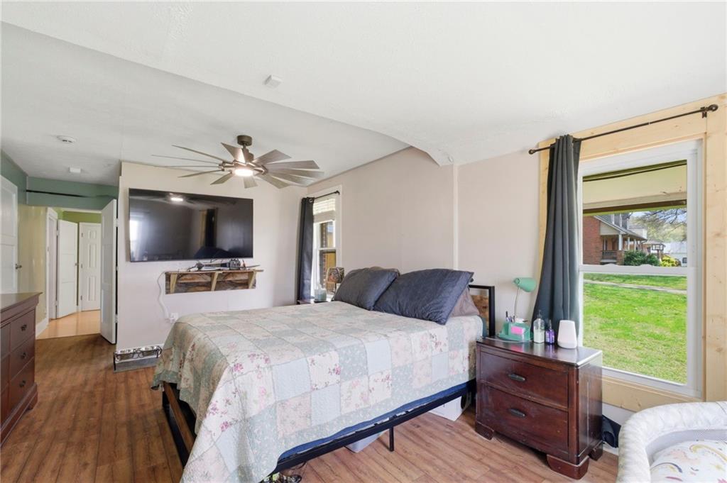 21 School Street Northeast Rydal, GA 30171 - Photo 23 of 44 a bedroom with a bed and a flat screen tv