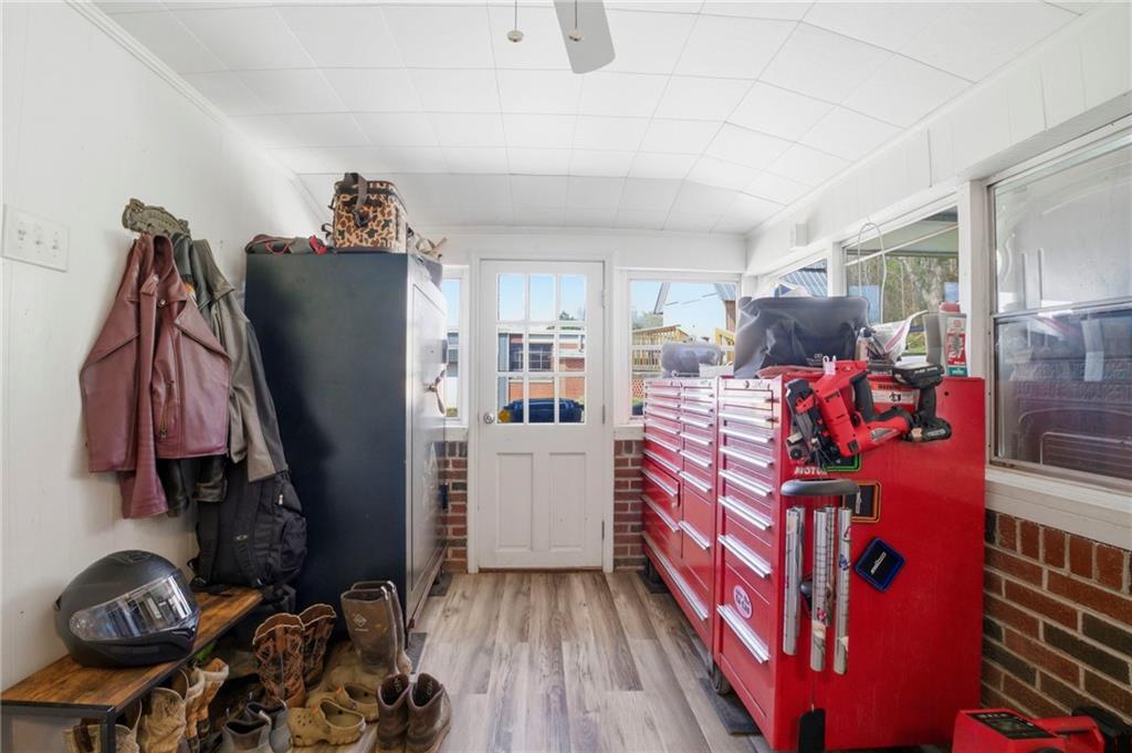 21 School Street Northeast Rydal, GA 30171 - Photo 30 of 44 a bed room with a bed and a book shelf