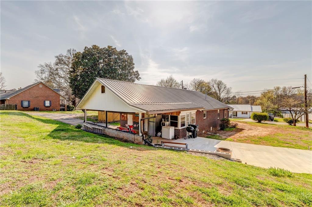 21 School Street Northeast Rydal, GA 30171 - Photo 3 of 44 a swimming pool view with a outdoor seating
