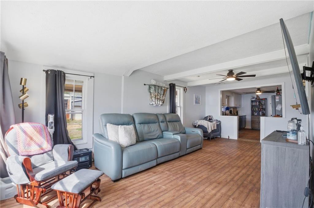 21 School Street Northeast Rydal, GA 30171 - Photo 10 of 44 a living room with furniture and wooden floor