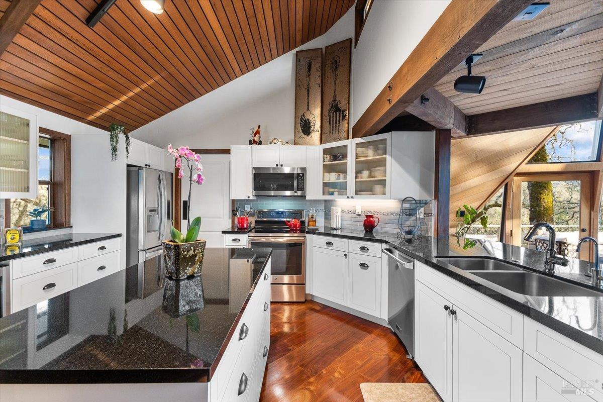 10045 Loch Haven Drive Santa Rosa, CA 95404 - Photo 13 of 37 a kitchen with lots of counter top space and appliances