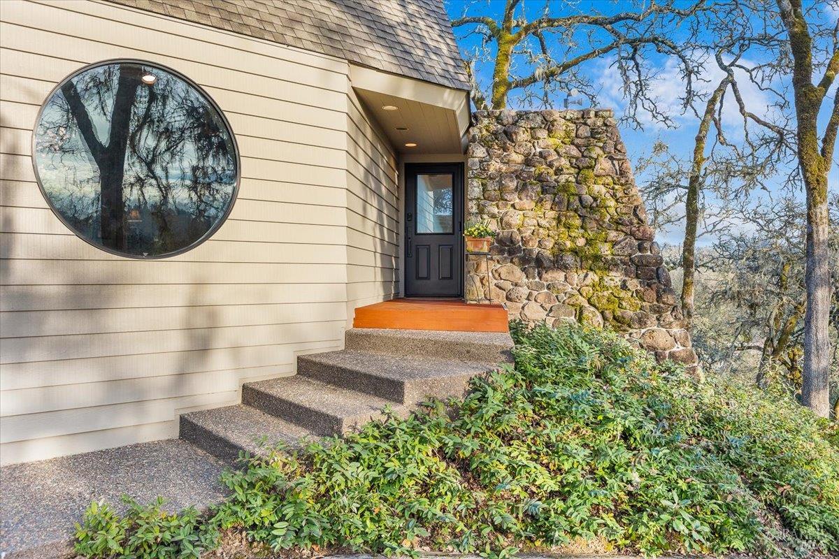 10045 Loch Haven Drive Santa Rosa, CA 95404 - Photo 2 of 37 a bathroom with a toilet and mirror