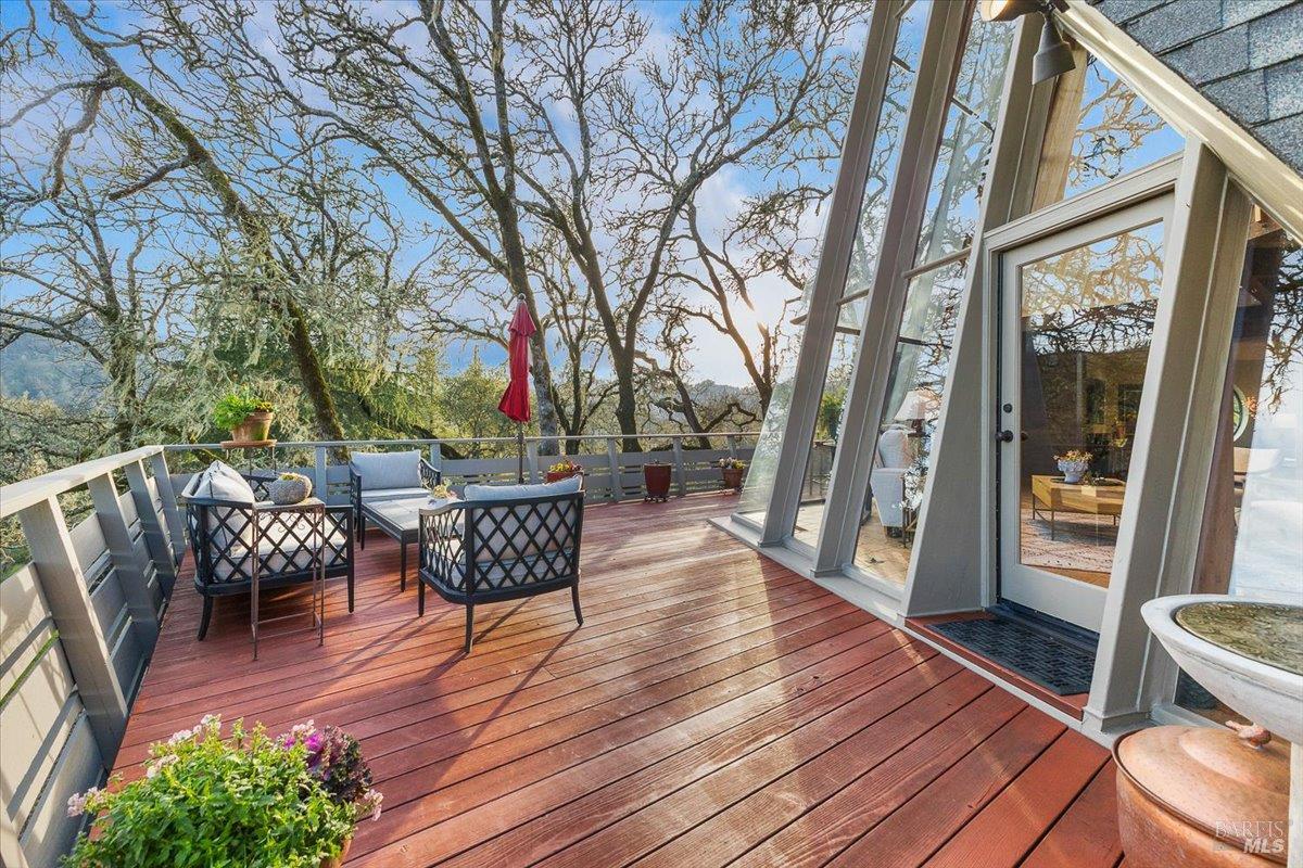 10045 Loch Haven Drive Santa Rosa, CA 95404 - Photo 24 of 37 a patio with wooden floor and outdoor seating