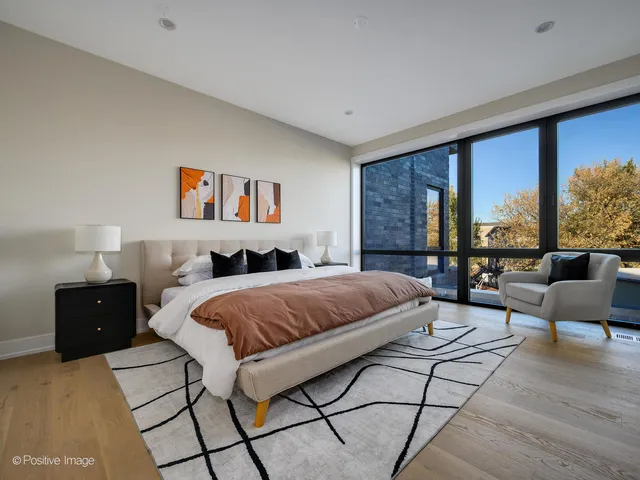 a bed room with a bed and a couch