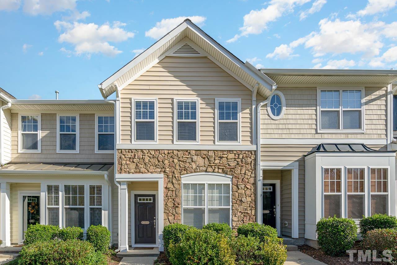 6022 Viking Drive Raleigh, NC 27612 - Photo 1 of 11 a view of a brick house with large windows