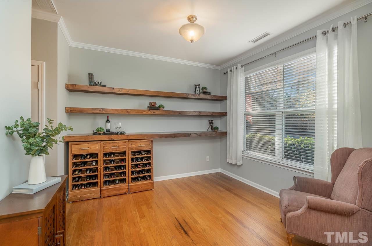 6022 Viking Drive Raleigh, NC 27612 - Photo 2 of 11 a view of a livingroom with furniture and a window