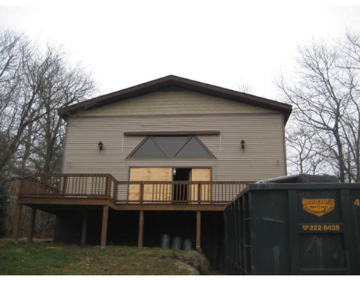 a front view of a house with balcony