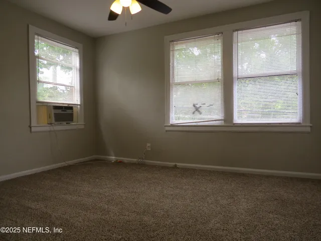 an empty room with a window