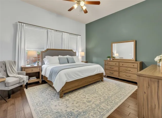 a bedroom with a bed and a couch