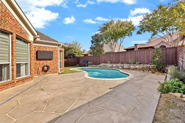 a view of a house with a swimming pool
