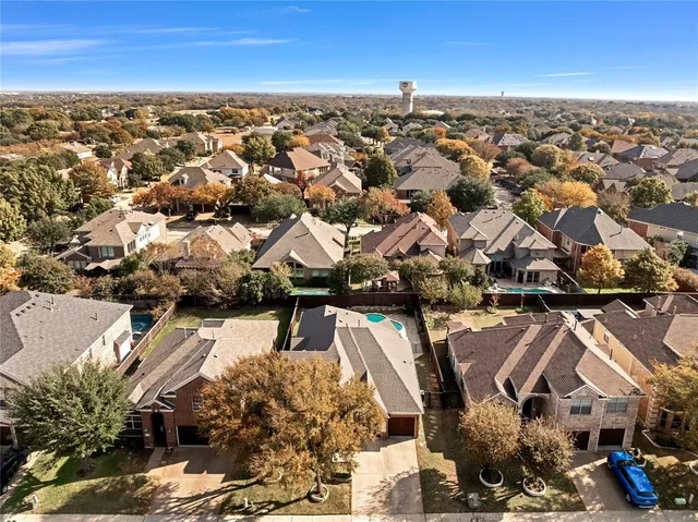 an aerial view of residential building with parking space