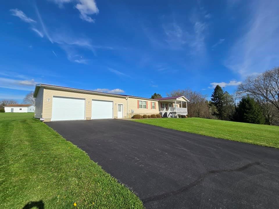 540 Maple Grove Road Rimersburg, PA 16248 - Photo 7 of 47 a view of house with a big yard