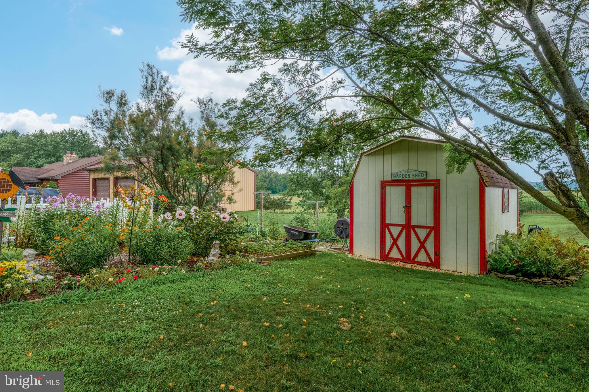 4451 Pine Hill Road Dover, PA 17315 - Photo 33 of 36 a house with trees in front of it