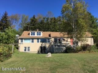 274 Bates Road Windsor, MA 01270 - Photo 8 of 44 a view of a house with backyard