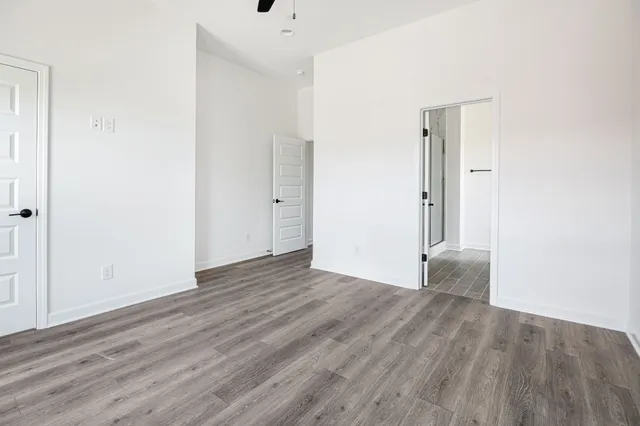 a bathroom with a double vanity sink and mirror
