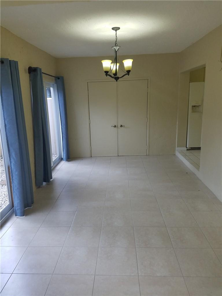 6659 Via Regina, Unit 6659 Boca Raton, FL 33433 - Photo 13 of 38 a view of empty room with a fireplace