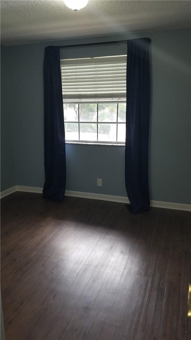6659 Via Regina, Unit 6659 Boca Raton, FL 33433 - Photo 17 of 38 a view of room with window