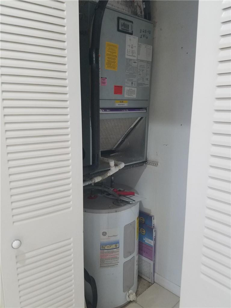 6659 Via Regina, Unit 6659 Boca Raton, FL 33433 - Photo 31 of 38 a view of storage and utility room