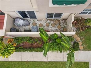 6659 Via Regina, Unit 6659 Boca Raton, FL 33433 - Photo 33 of 38 a view of fountain in backyard