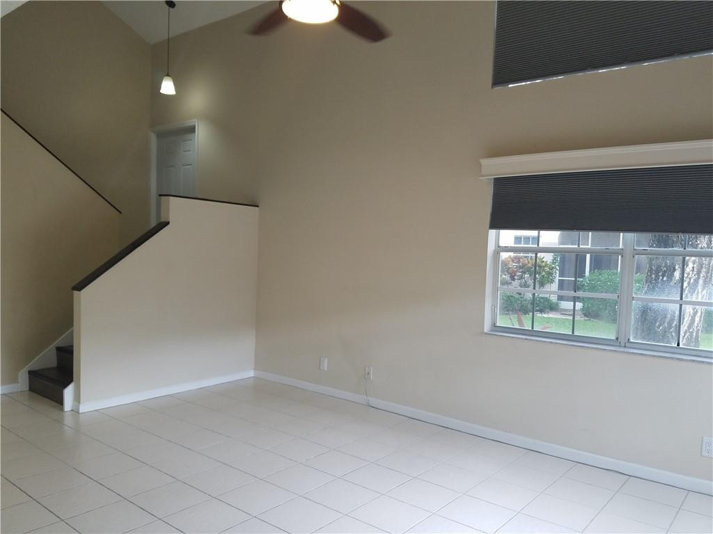 6659 Via Regina, Unit 6659 Boca Raton, FL 33433 - Photo 4 of 38 a view of empty room with windows